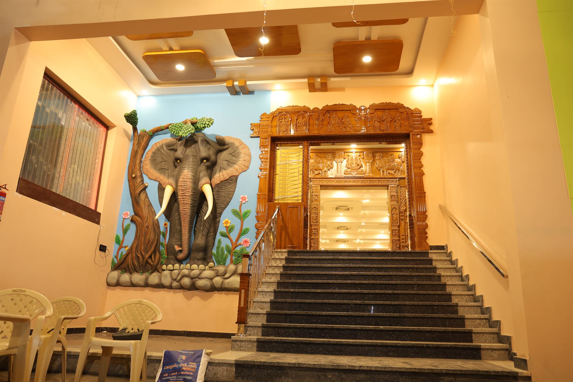 Entrance and staircase area at MS Grand Mahal A/C